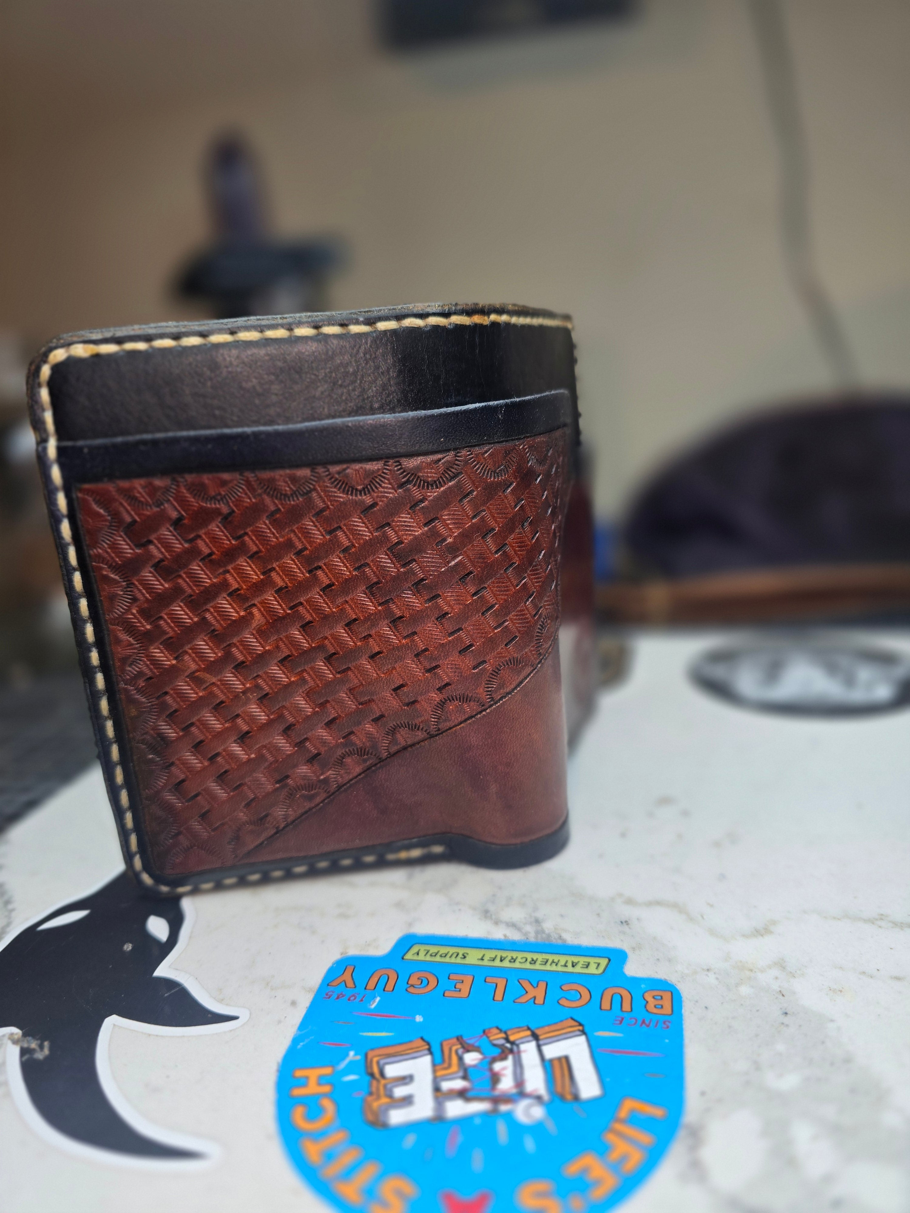 Hand tooled veg tan wallet